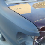 Before and after photographs of a damaged Chevy Impala that was repaired by Elite Paint & Body Shop in West Palm Beach, Florida.